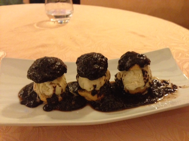 three perfect profiteroles